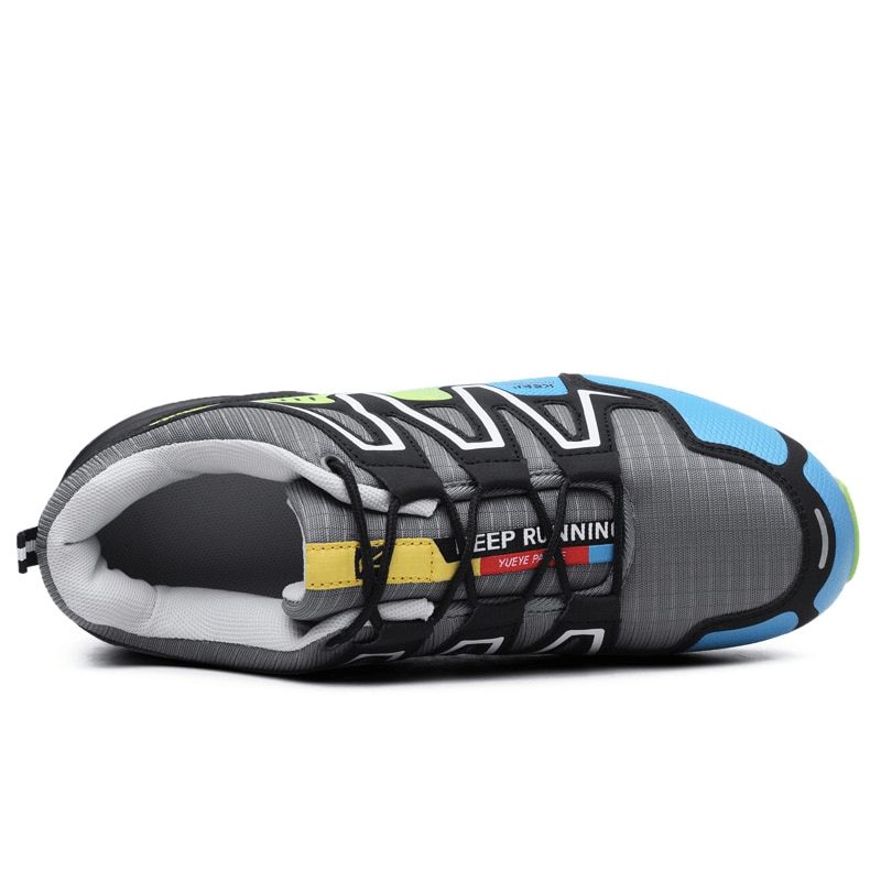 Top view of stylish men's waterproof non-slip sneakers with colorful geometric design, perfect for sports and casual wear.